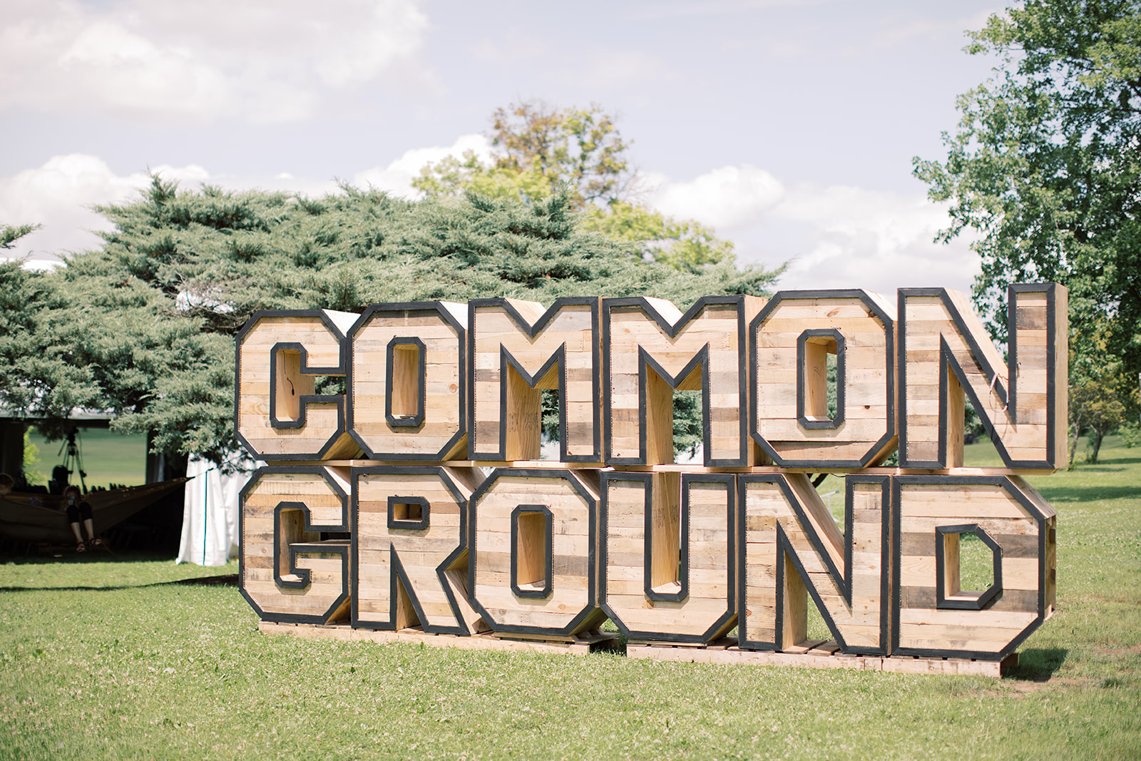 Common Ground wooden sign in outdoor setting